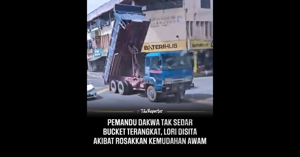 Polis menyita sebuah lori pasir selepas tular video kenderaan tersebut melanggar kabel lampu isyarat di Pekan Nanas akibat kegagalan pemandu menurunkan bahagian belakang atau bucket.